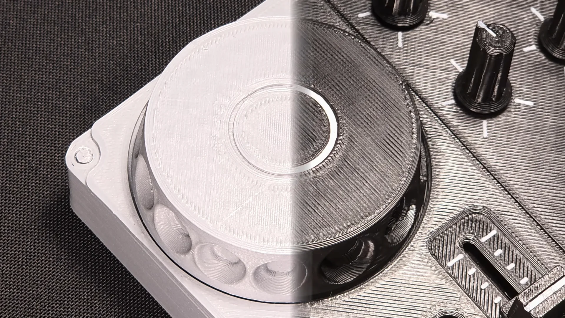 Close-up of the jog wheel, the earlier version on the left and the new one on the right