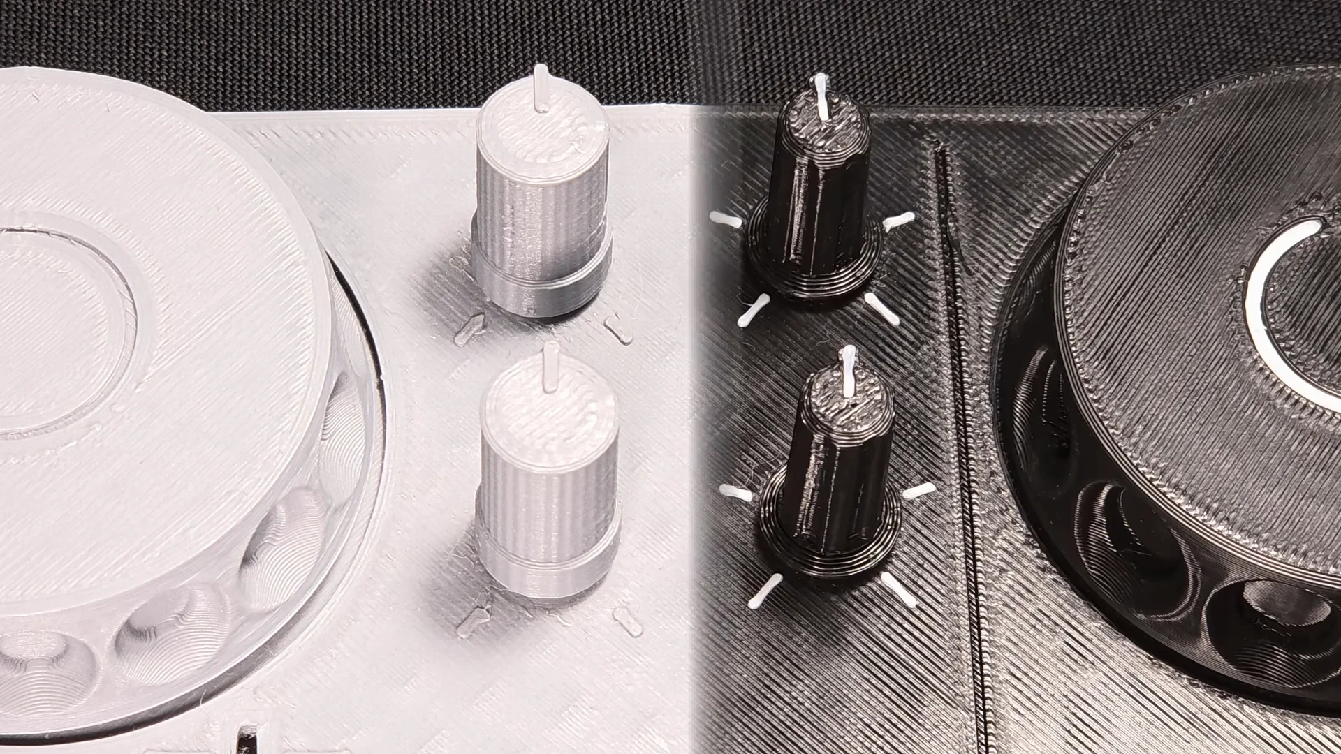 Close-up of the knobs between the jog wheels, the earlier version on the left and the new one on the right